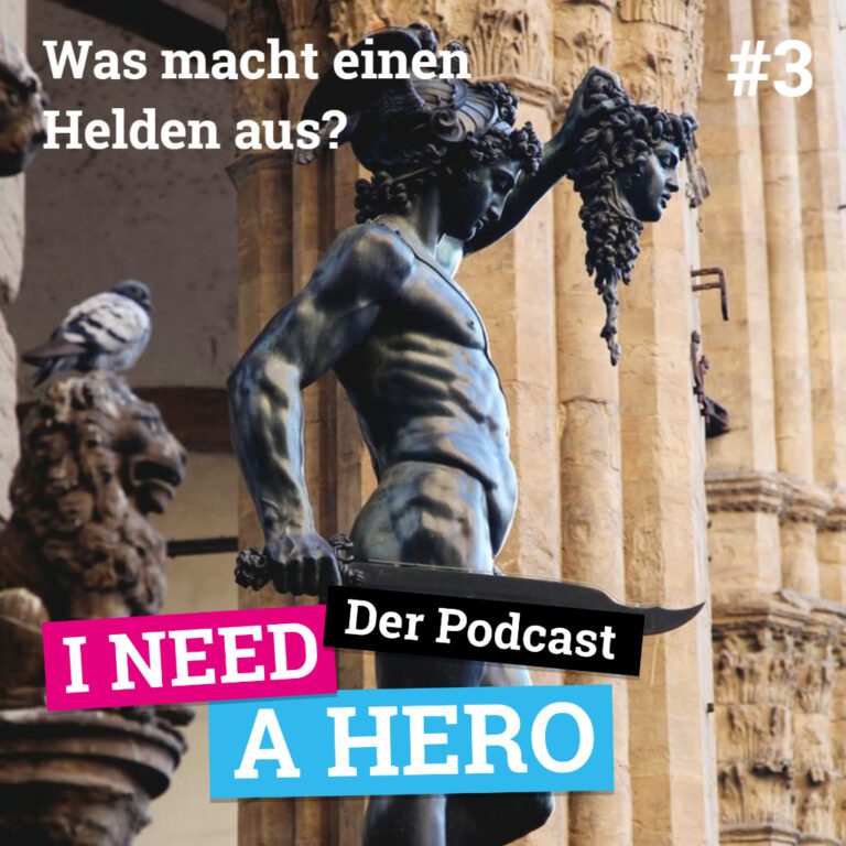 Statue mit Schwert und Kopf in den Händen. Rechts oben Schriftzug "Was macht einen Helden aus?". Unten mittig Schriftzug in verschiedenen Farben: "I need a Hero - Der Podcast"