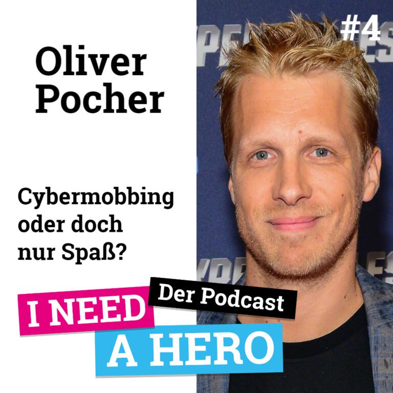 Mann mit blondem Haar schaut freundlich. Rechts Schriftzug "Oliver Pocher Cybermobbing oder doch nur Spaß?". Unten mittig Schriftzug in verschiedenen Farben: "I need a Hero - Der Podcast"