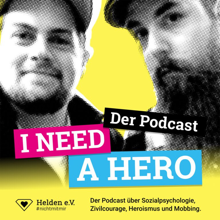 Zwei Männer im Comic-Stil auf gelbem Hintergrund. In der Mitte ein Schriftzug in verschiedenen Farben: "I need a Hero - Der Podcast"